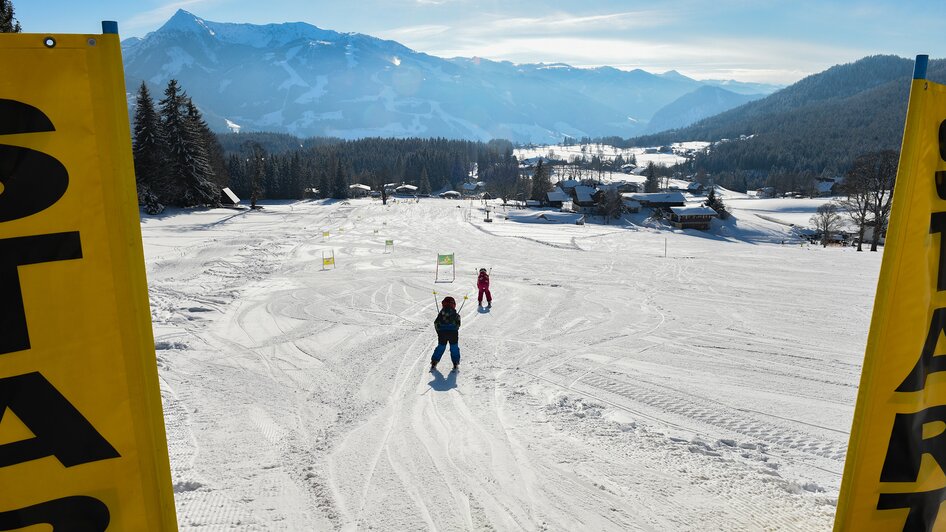 Skifahren beim Drachenlift.